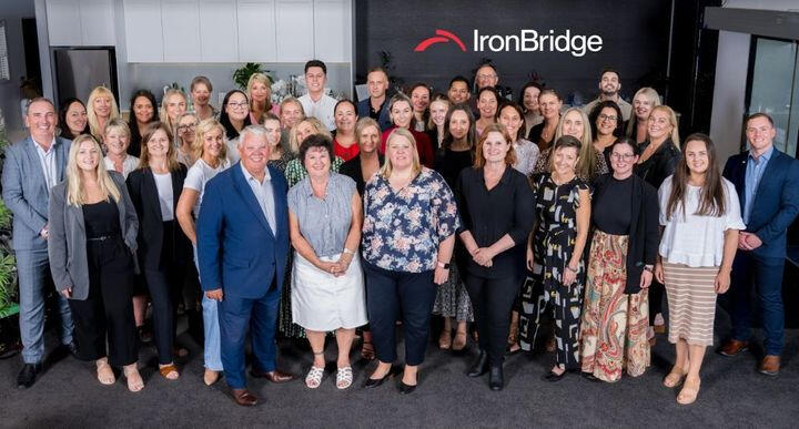 Iron Bridge Property Group team celebrating 20 years of excellence in property management and real estate management in Auckland and the North Shore.